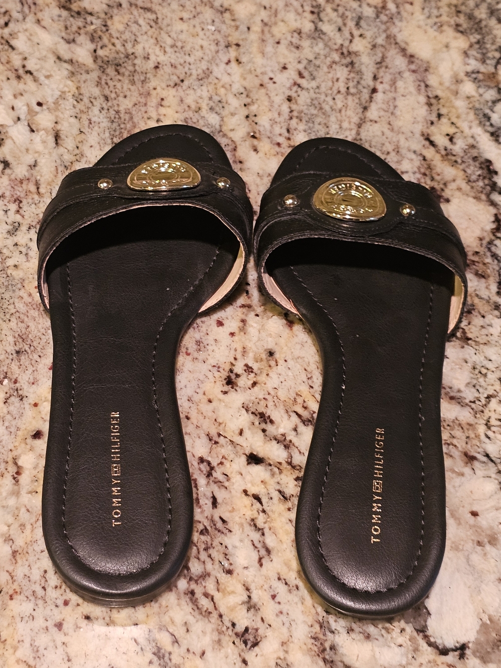 Tommy Hilfiger Twicela Black Leather Slide Sandals with Gold Accent